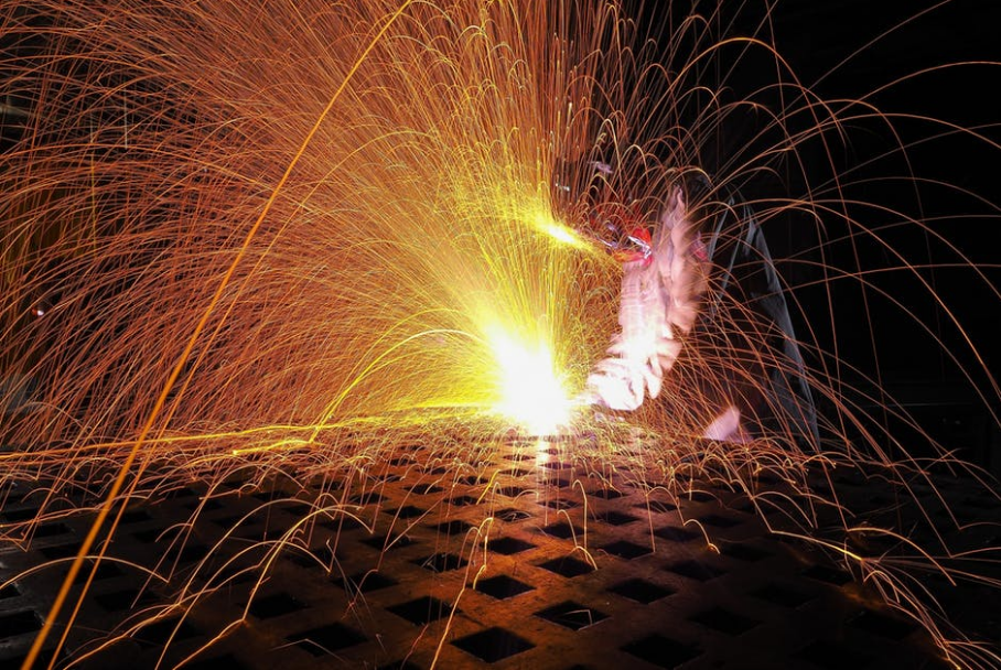 man welding